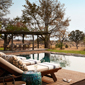 Outdoor Lounge and private pool at Singita Boulders Lodge overlooking the 45 000 acre game reserve in the Sabi Sand Reserve adjacent to the Kruger National Park