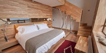 Split over two levels, these generously sized suites (549 square feet/51 square meters) at Tierra Patagonia Hotel feature a cozy living room on the top floor and a large double room with ensuite downstairs