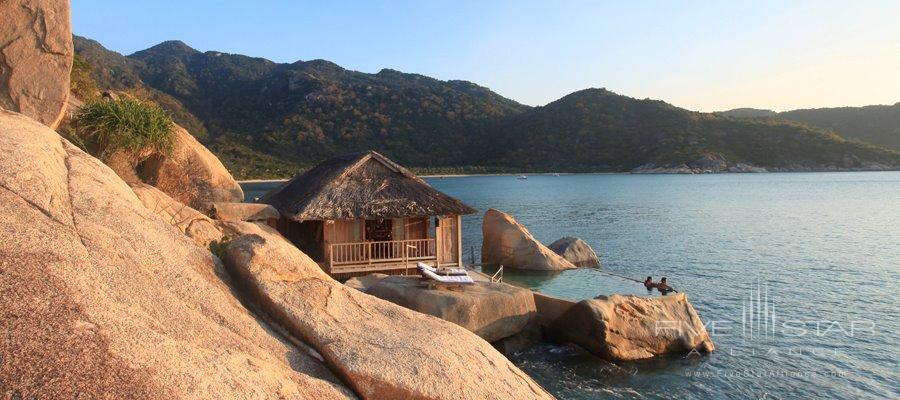 The unique Rock Pool Villas are lapped by the balmy waters of the East Vietnam Sea. Each has a private plunge pool set into the rocks. The villas offer separate sleeping and living areas. They are elegant and spaciouscombining en-suite bathroomswalk-in-closetsseparate vanity areas and handcrafted bathtubs. The villas are accessed by a scenichillside staircase and far from other villasthus ensuring absolute privacy.